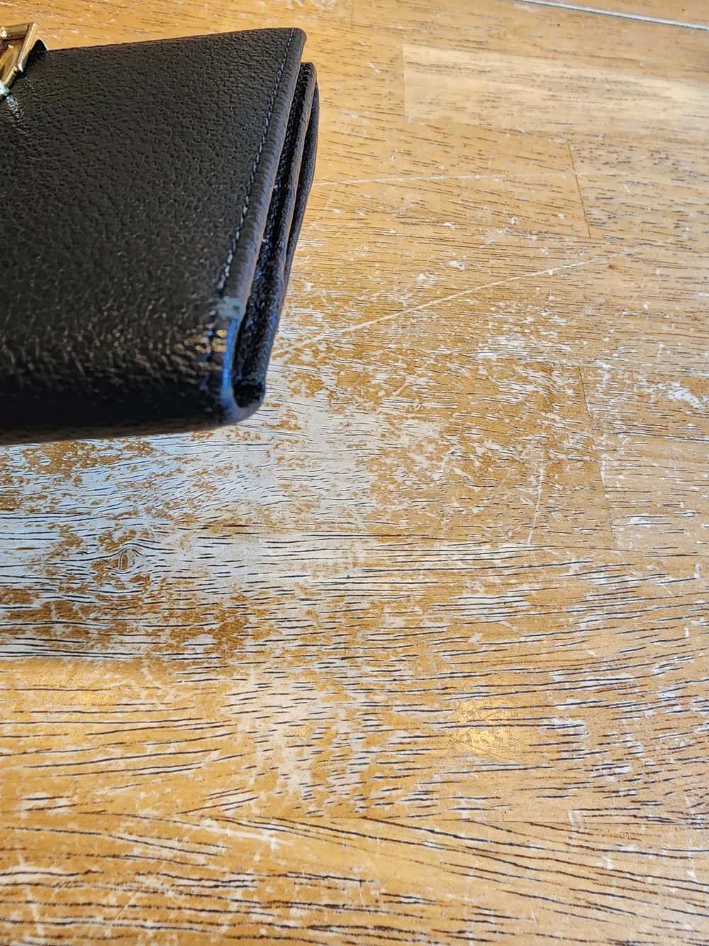 vintage Gucci black textured leather compact bifold wallet